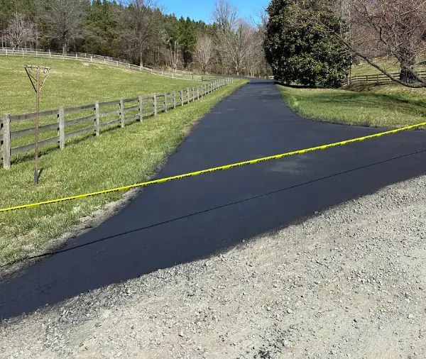 The same driveway after a fresh sealcoat